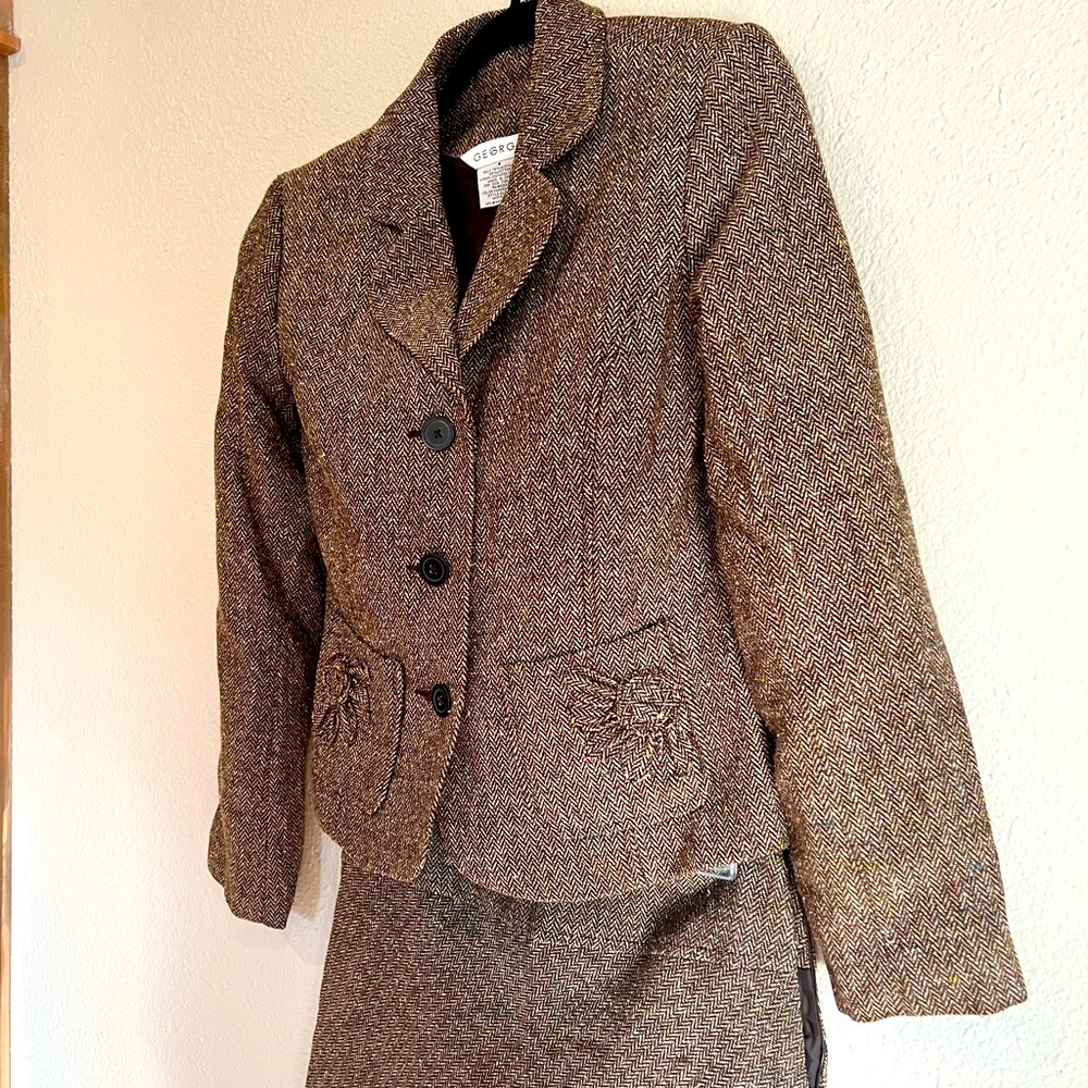 Skirt suit, brown tweed with color flex, flower details on jacket and skirt.